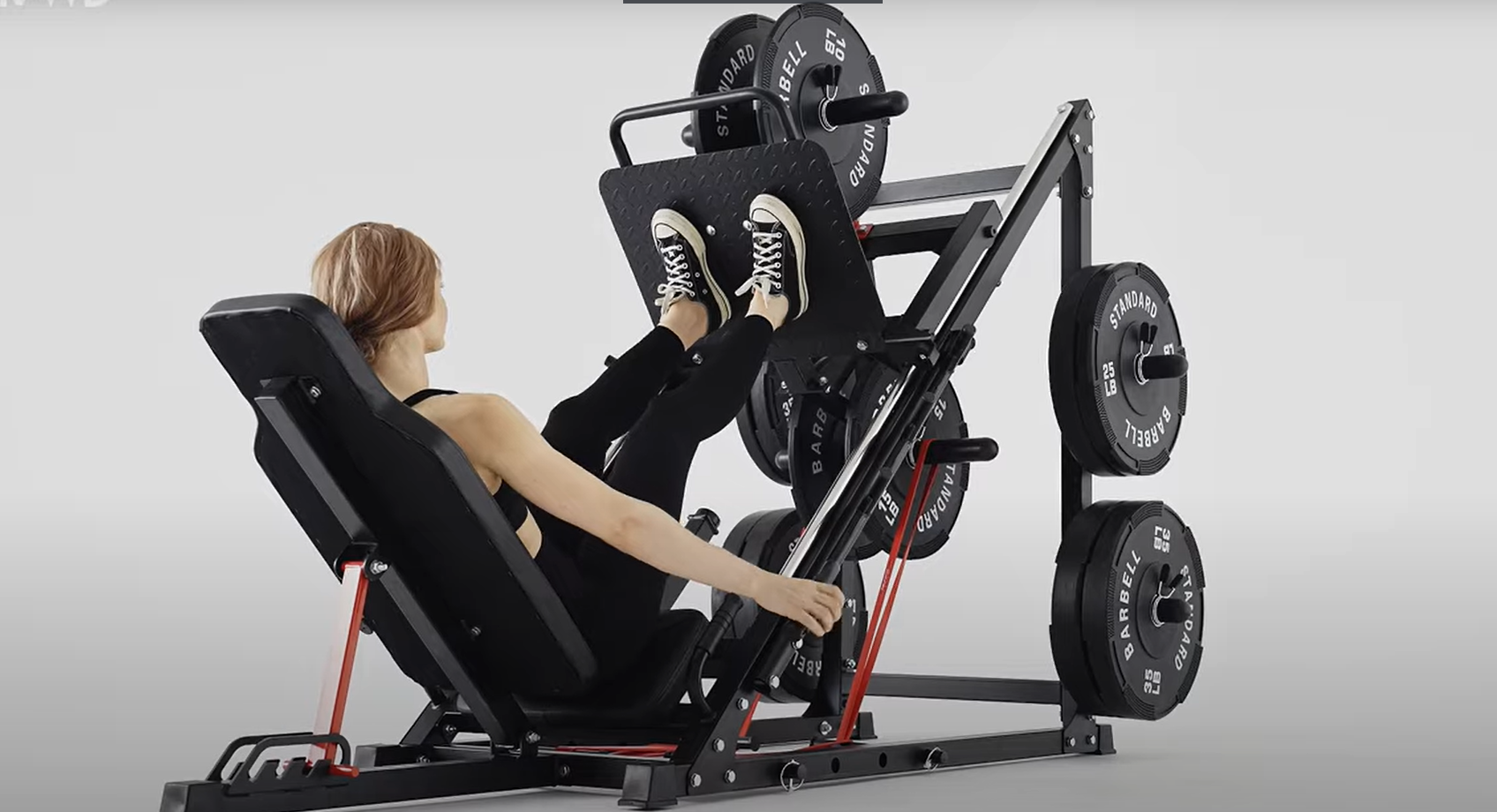 a woman does fitness on leg press machine - GMWD Fitness